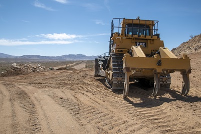 behind a bulldozer